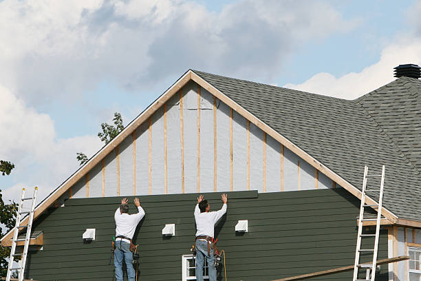 Professional Siding Installation technician working in Glen Cove, NY